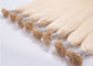 Le estensioni a 20 pollici dei capelli di Remy di colore dell'oro cuociono a vapore elaborato con la cuticola piena fornitore